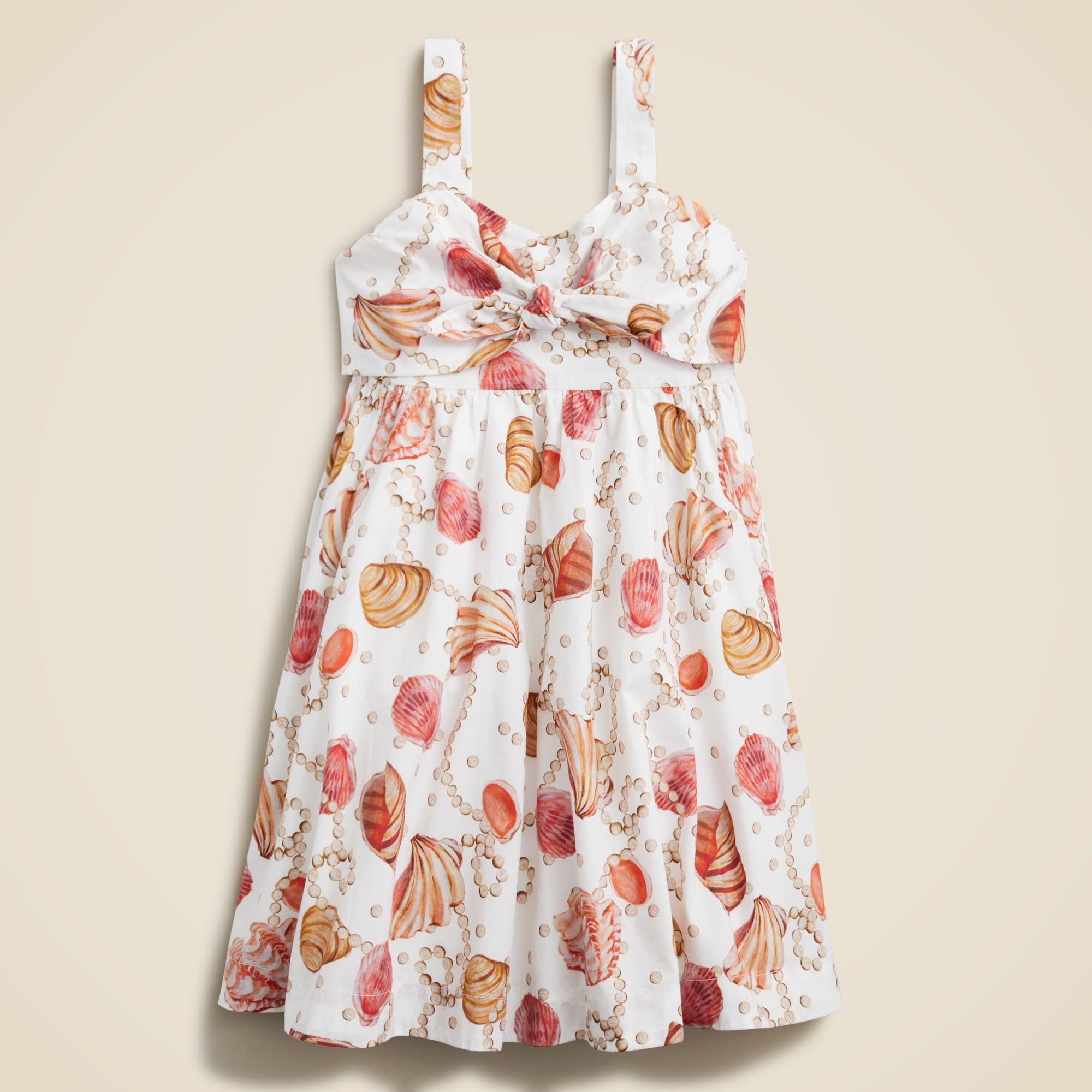  Girls' bow-front dress in painted seashell print