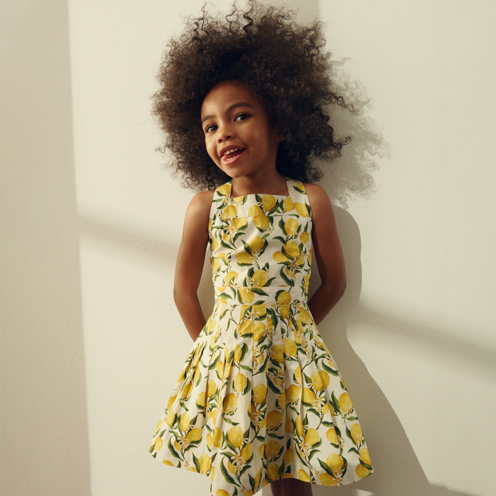  Girls' apron dress in lemonade print